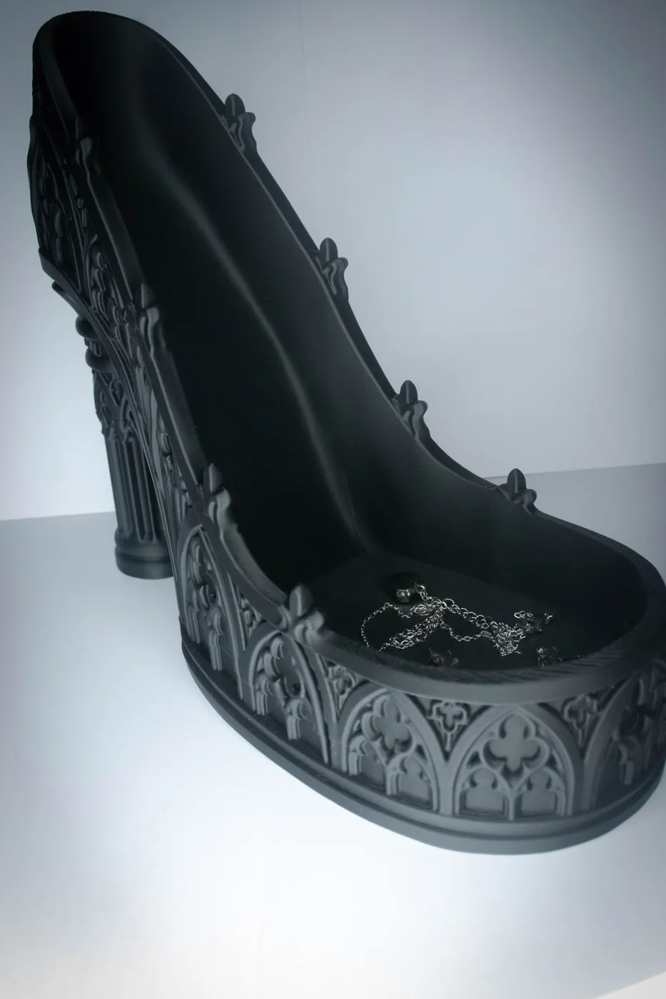 Dark grey 3D-printed gothic high heel jewelry stand with cathedral tracery and a column-shaped heel